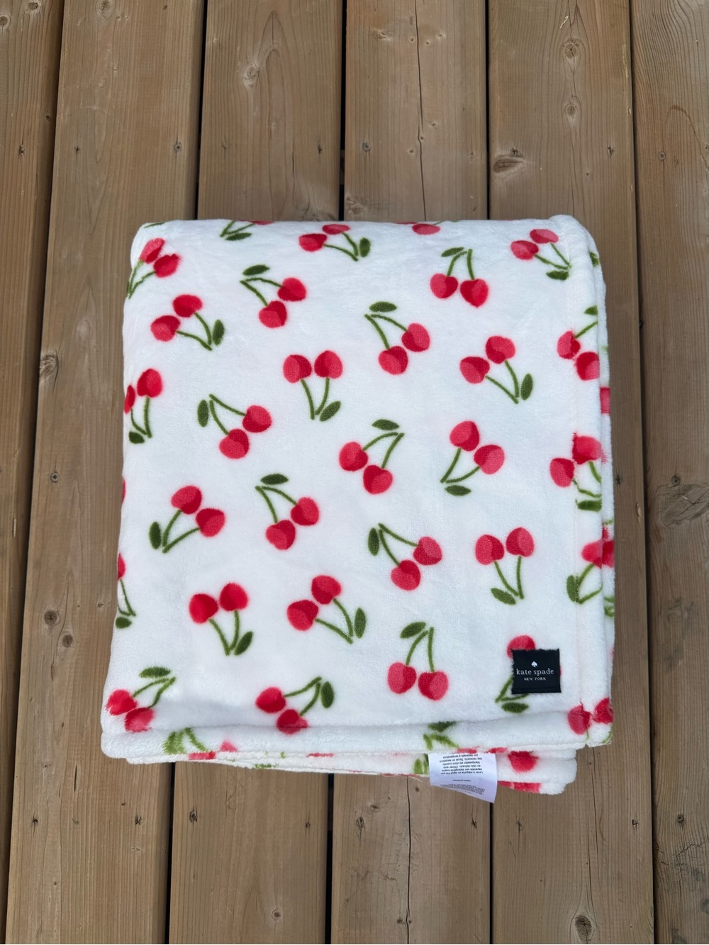 kate spade White Plush Throw with Red Cherry Motif